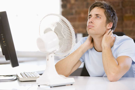 Image of a man frustrated in front of a fan for marketing