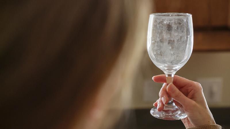 Image of hard water stains on a wine glass