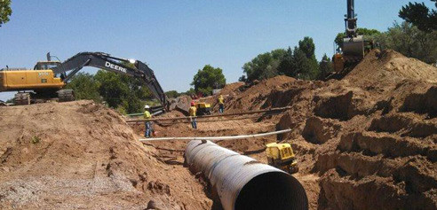 Image of the Los Lunas crew working on a culvert