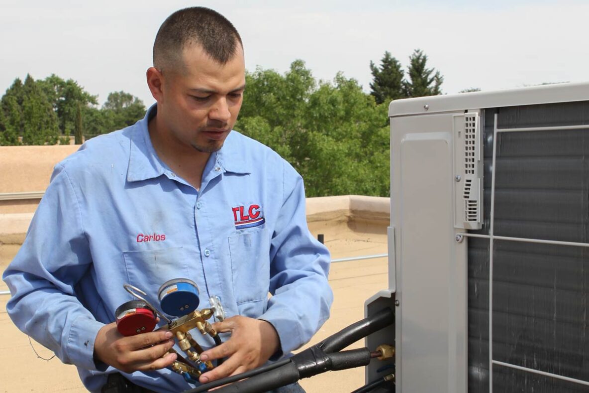 TLC-hvac-technician-installing-refrigerated-air