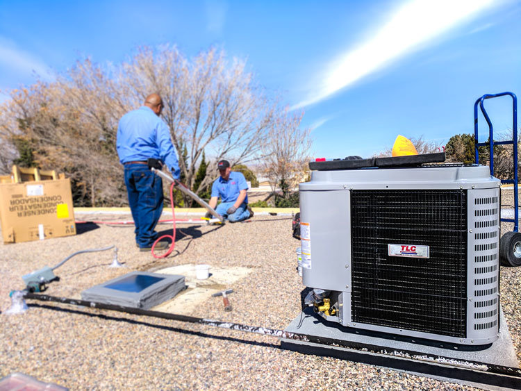 Image of men installing new equipment