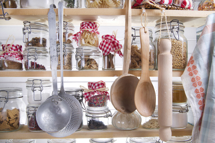 Image of hanging utensils in a pantry